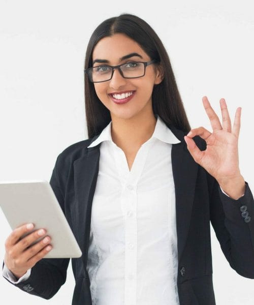 smiling-elegant-woman-with-tablet-showing-ok-sign